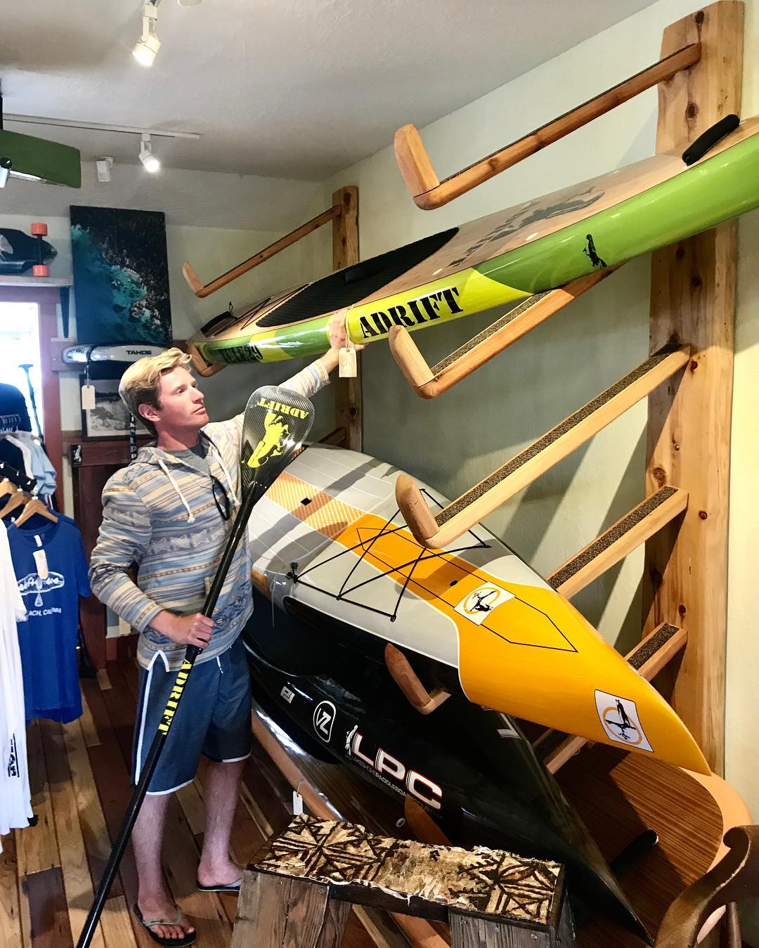 employee organizing paddle shop in Lake Tahoe California